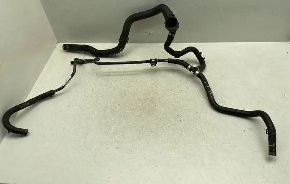 Volkswagen Golf VII Engine coolant pipe/hose 04E121064N