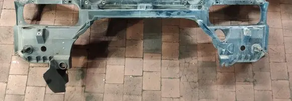 Top upper radiator support slam panel