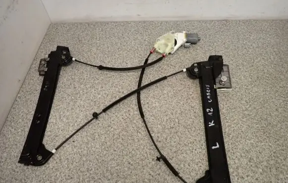 Nissan Micra C+C Front door window regulator with motor