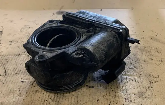 Volkswagen Touran I Throttle valve 03G128063C 0605061046 A2C53099815