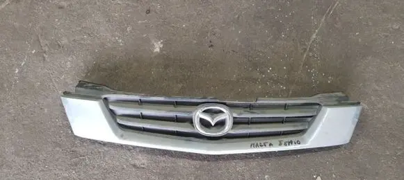 Mazda Demio Front bumper upper radiator grill