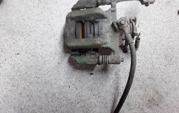 Opel Astra J Rear brake caliper