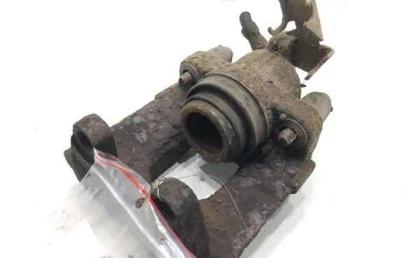 Volkswagen Touareg I Rear brake caliper 