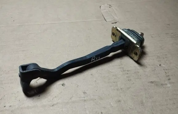 Rear door check strap stopper