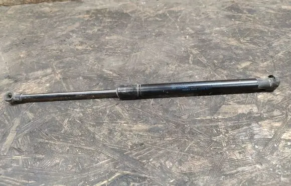 Volkswagen Caddy Front bonnet/hood damper/strut 1T0823359A