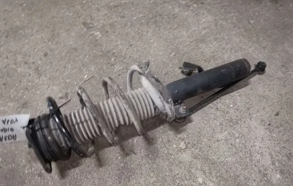 Mazda 3 II Front shock absorber with coil spring BBM334700C