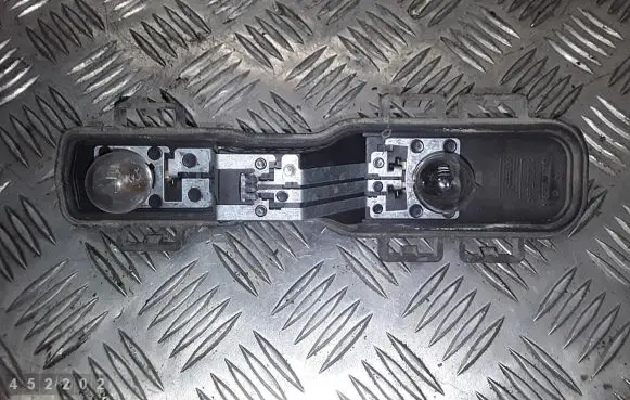 Nissan Primera Tail light bulb cover holder 89025242