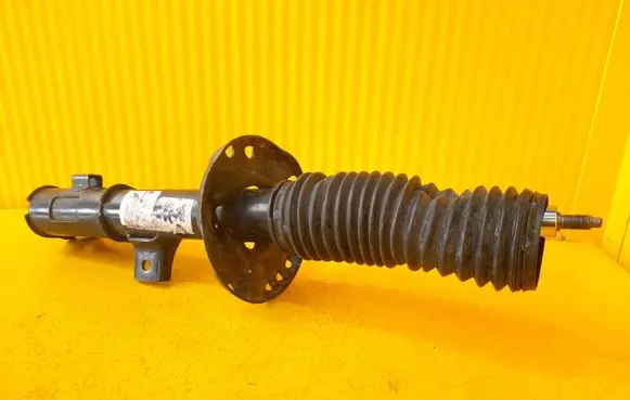 KIA Sportage Front shock absorber/damper D10L54650F1000 T18E23C3265