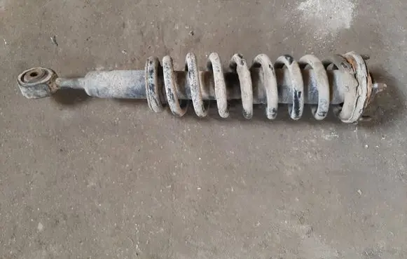Toyota Land Cruiser (J200) Front shock absorber with coil spring