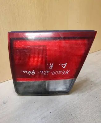 Mazda 626 Tailgate rear/tail lights 94313977