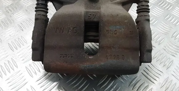 Volkswagen Golf VII Front brake caliper