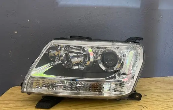 Suzuki Grand Vitara II Headlight/headlamp 10059079 9922681017 W3T15971