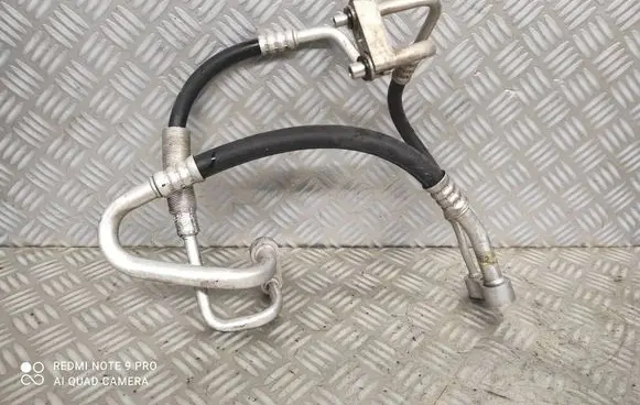 Opel Corsa D Air conditioning (A/C) pipe/hose 13203316