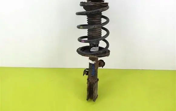 Toyota Corolla E120 E130 Front shock absorber with coil spring 