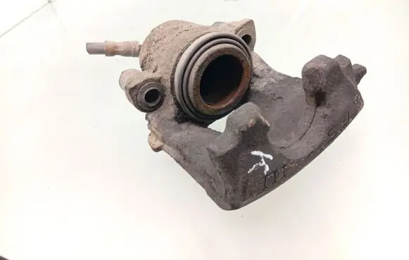 Volkswagen Golf VI Front brake caliper 