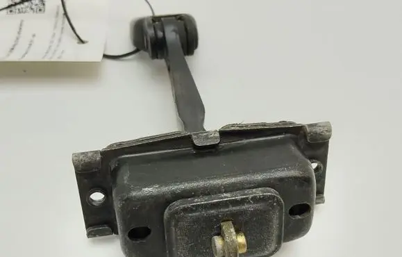Front door check strap stopper