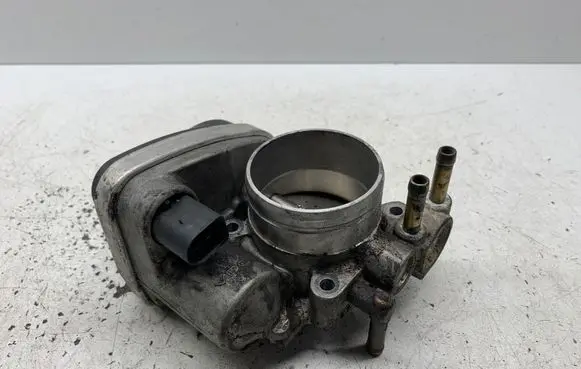 Volkswagen Touran I Throttle valve 06A133062AD A2C53043740 07464