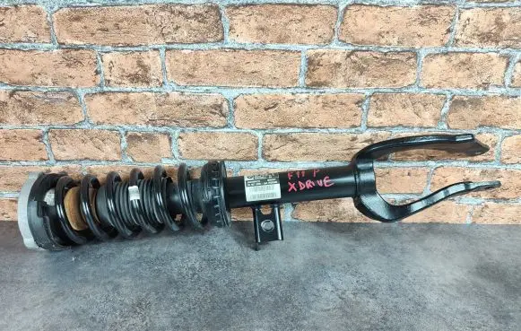 BMW 5 F10 F11 Front shock absorber with coil spring 6863664