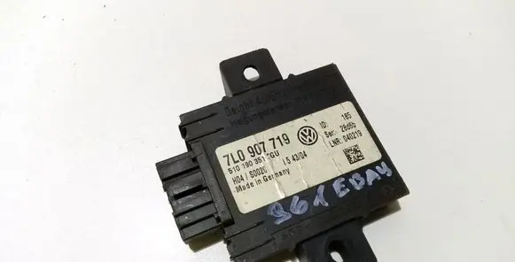Volkswagen Touareg I Alarm control unit/module 7L0907719
