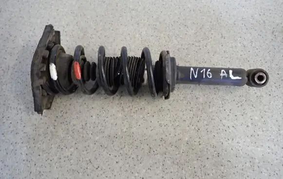 Nissan Almera N16 Front shock absorber with coil spring 
