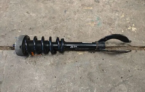 Front shock absorber with coil spring