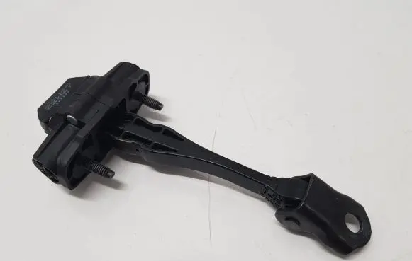 Front door check strap stopper