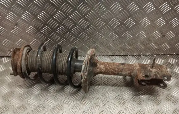 Nissan Almera N16 Front shock absorber with coil spring