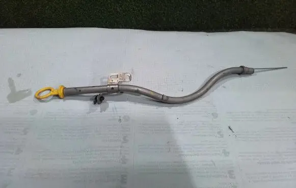 Oil level dip stick