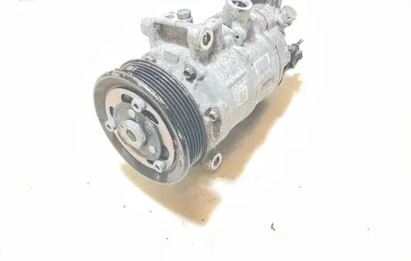 Volkswagen Golf VII Air conditioning (A/C) compressor (pump) 5Q0820803