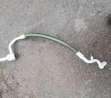 Ford Puma Air conditioning (A/C) pipe/hose L1BH19F618AA GS6XA