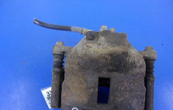 Nissan Almera Tino Front brake caliper
