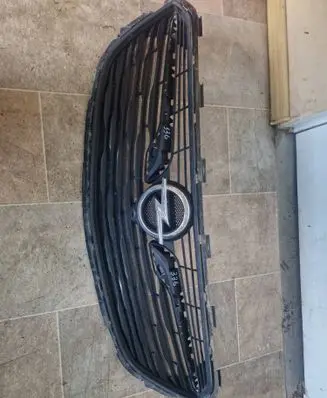 Opel Insignia B Front bumper upper radiator grill 90910001602