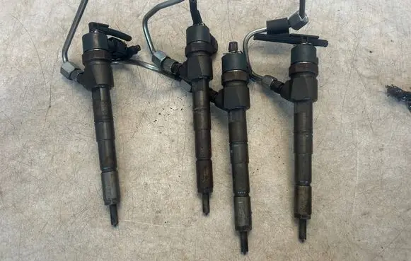 Opel Astra J Fuel injectors set 55577668 0445110423