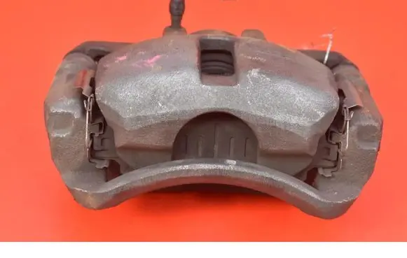 Suzuki Grand Vitara I Front brake caliper