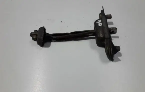 Mazda 626 Rear door check strap stopper