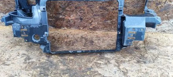 Radiator support slam panel