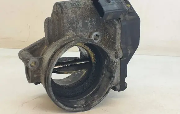 Volkswagen Touran I Throttle valve 03G128063M A2C53324665 1207081928