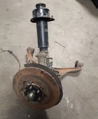 Suzuki Grand Vitara I Front wheel hub spindle knuckle
