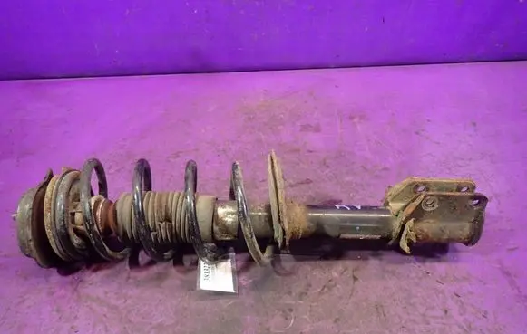 Lancia Ypsilon Front shock absorber with coil spring 