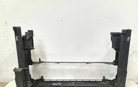 Radiator support slam panel