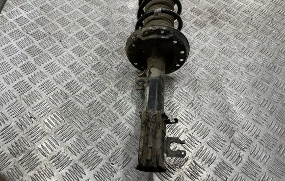 Opel Corsa D Front shock absorber/damper 13214358