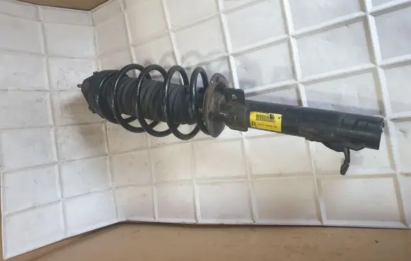 Mazda 2 Front shock absorber with coil spring 3M7118045AB