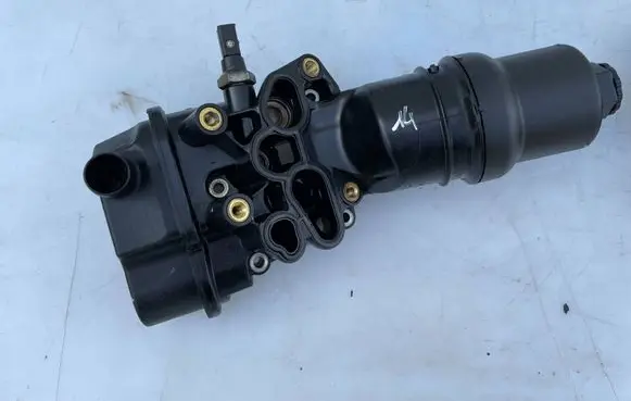 Seat Leon (1P) Oil filter mounting bracket 06F115397F