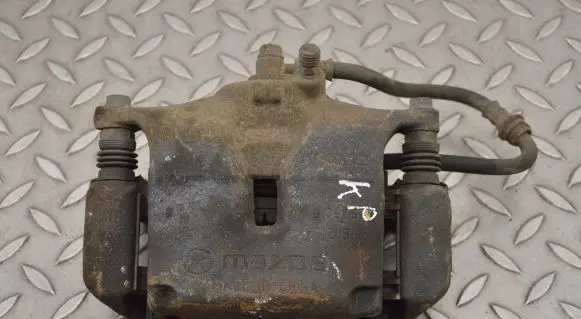 Mazda 3 II Front brake caliper