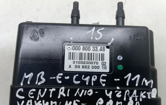 Mercedes-Benz E C207 W207 Central locking vacuum pump 0008003348