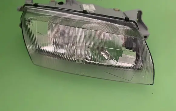 Mazda 323 Headlight/headlamp BG2L51030C