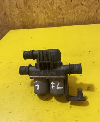 Coolant heater control valve