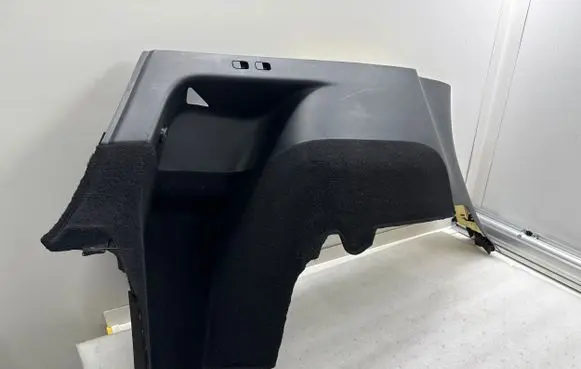 Trunk/boot lower side trim panel
