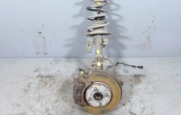 Front shock absorber with coil spring