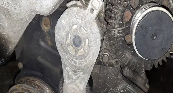 Volkswagen PASSAT B6 Generator/alternator belt tensioner 950371
